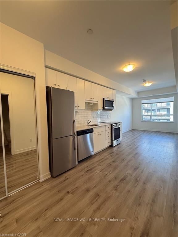 Photo 3 of Unit 406, 247 Northfield Dr E, Waterloo, Colonial Acres — HOMEH