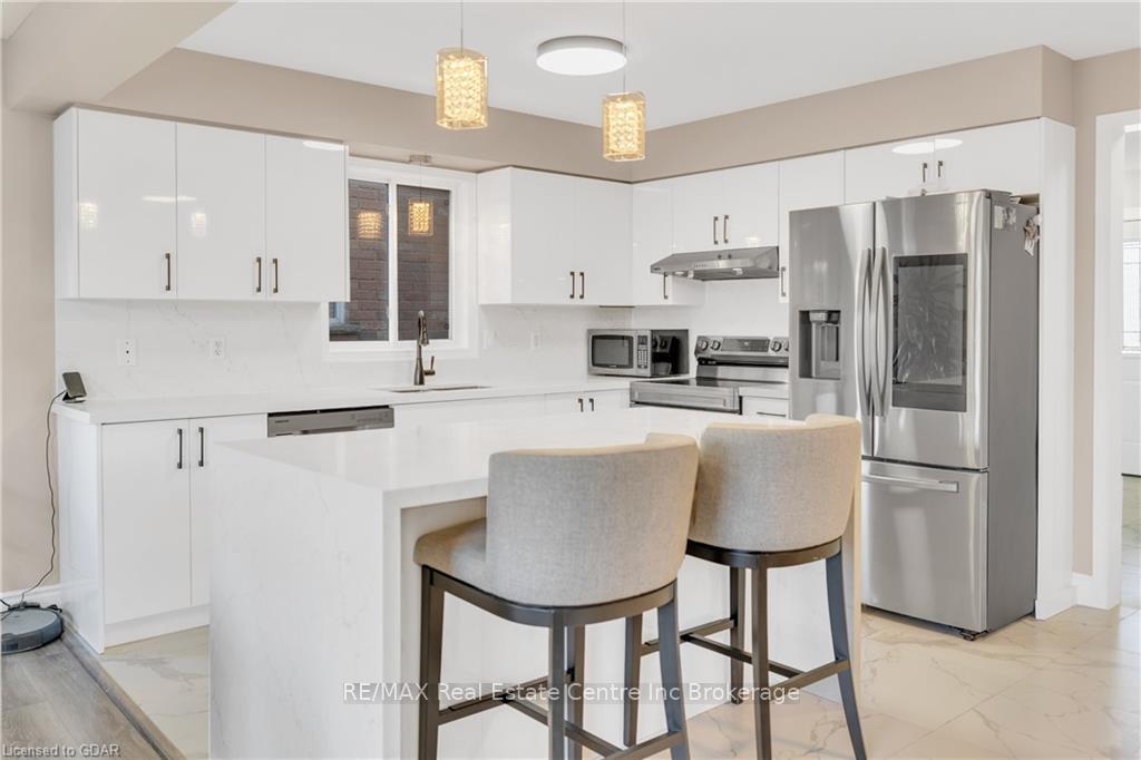 Photo 11 of 7 Drohan Drive, Guelph, Clairfields/Hanlon Business Park — HOMEH