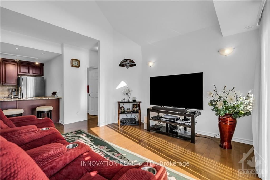 Photo 3 of Unit E, 135 HARTHILL Way E, Ottawa, Barrhaven - Heritage Park — HOMEH