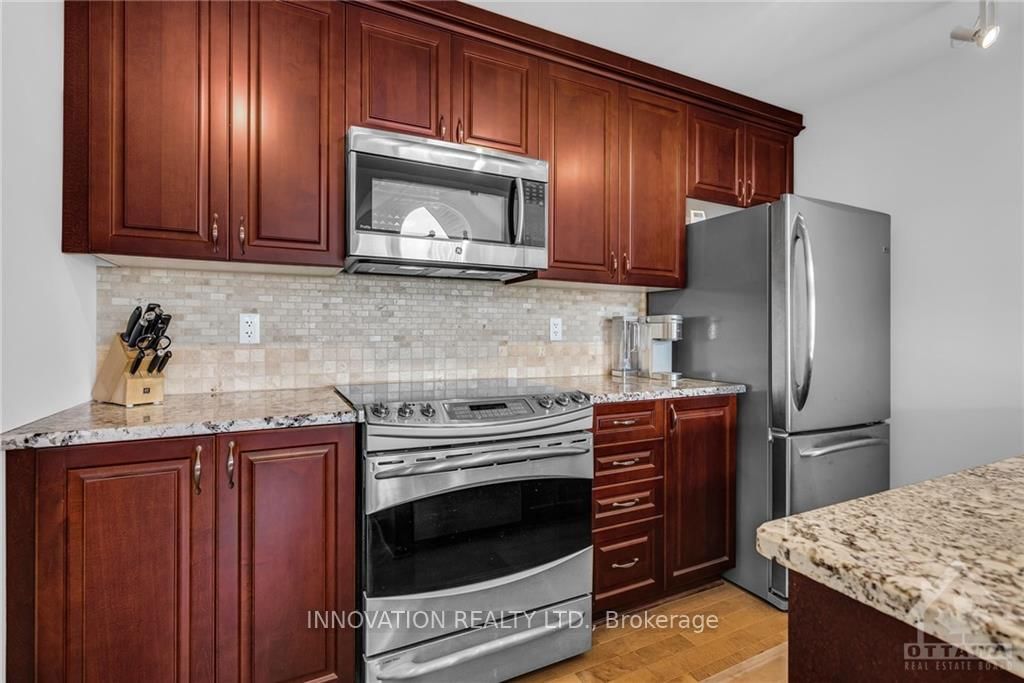 Photo 8 of Unit E, 135 HARTHILL Way E, Ottawa, Barrhaven - Heritage Park — HOMEH