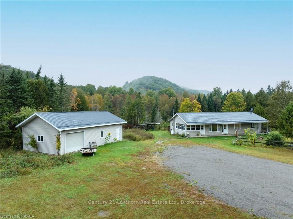Photo 1 of 1968 Matawatchan Road, Frontenac, Frontenac North — HOMEH