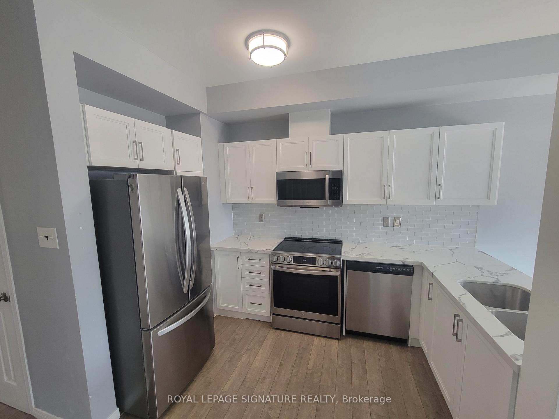 Photo 3 of Unit 51, 175 Stanley Street, Barrie, East Bayfield — HOMEH