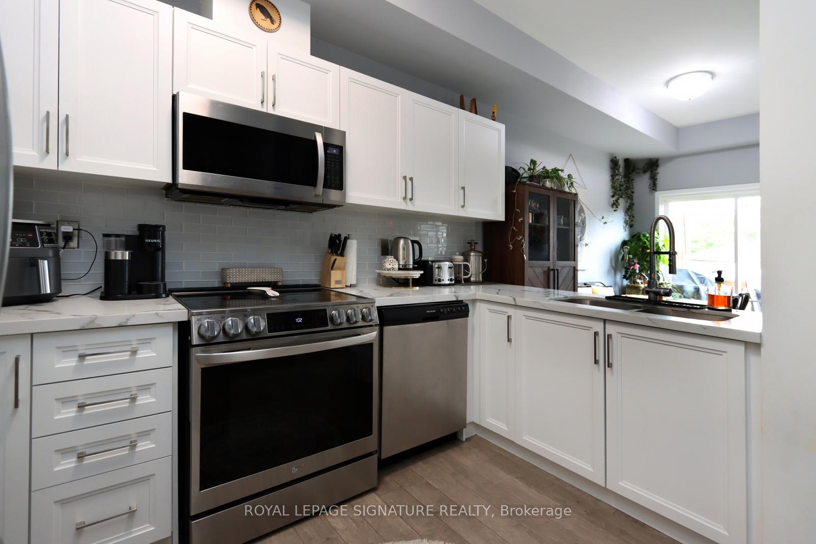 Photo 5 of Unit 51, 175 Stanley Street, Barrie, East Bayfield — HOMEH