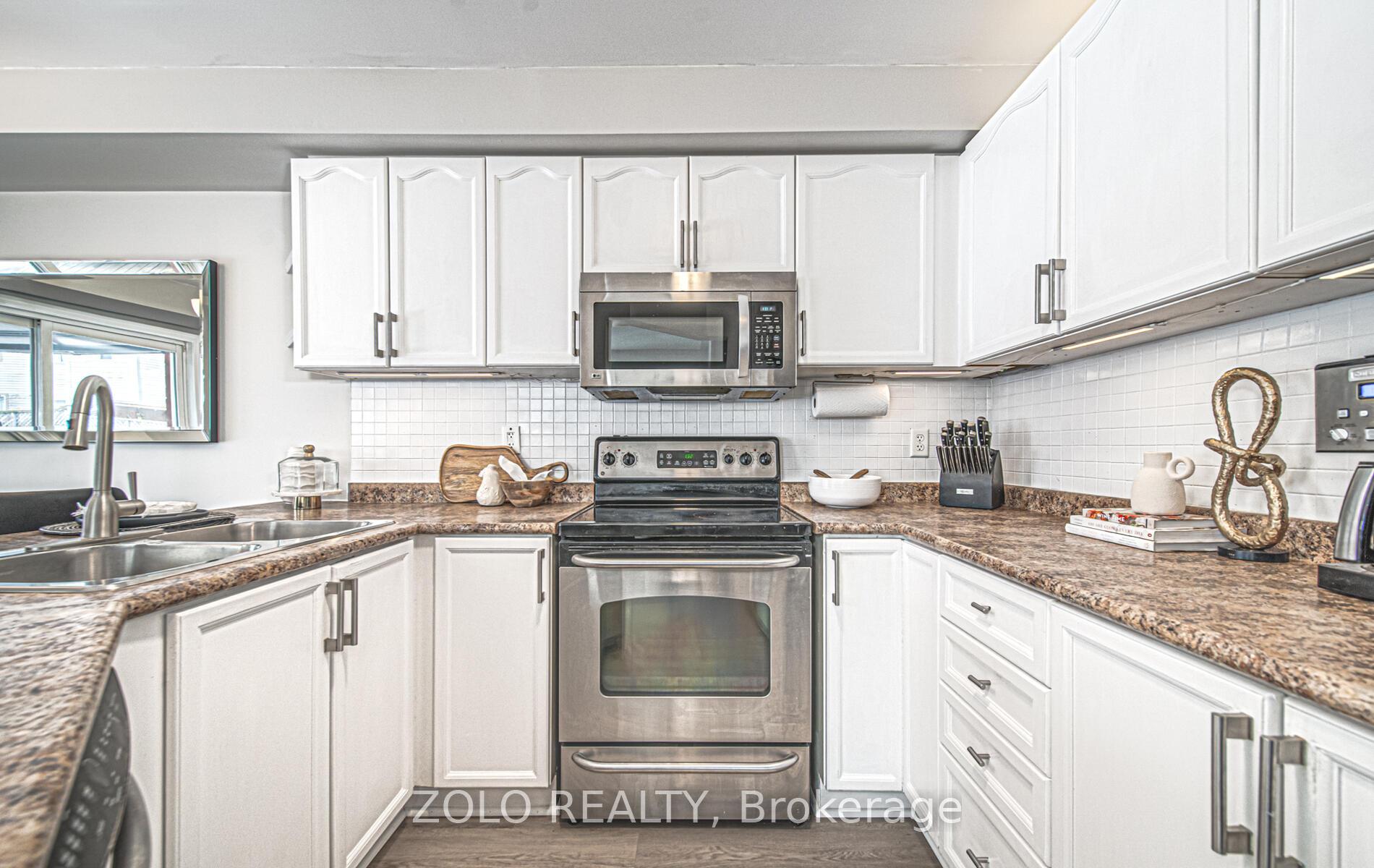 Photo 12 of 84 Millburn Drive, Clarington, Bowmanville — HOMEH