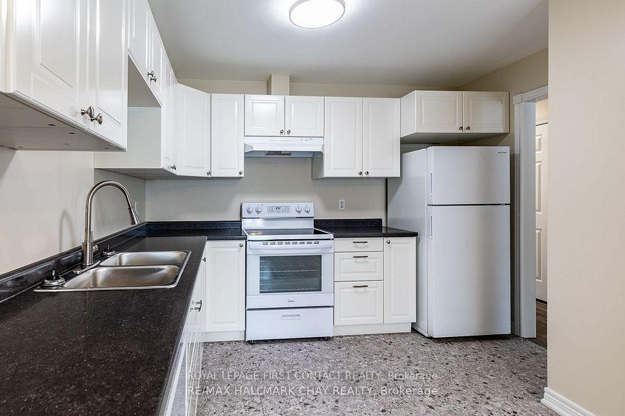 Photo 7 of Unit UPPER, 66 Downing Crescent, Barrie, Holly — HOMEH