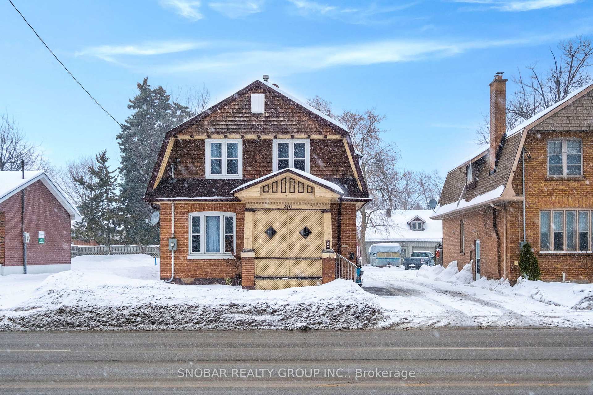 Front of 240 Dunlop Street W