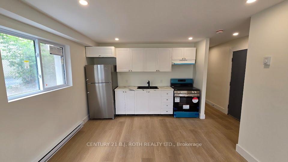 Photo 5 of Unit 1, 105 Gowan Street, Barrie, Allandale — HOMEH