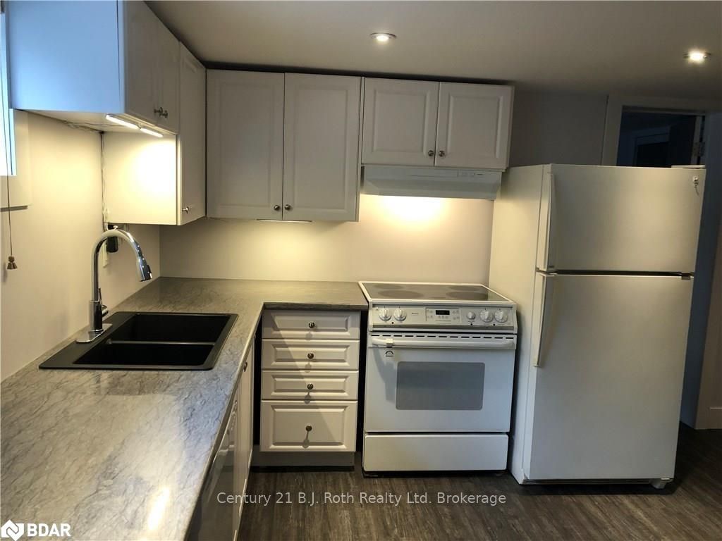 Photo 4 of Unit LOWER LEVEL, 219 Huronia Road, Barrie, Painswick North — HOMEH