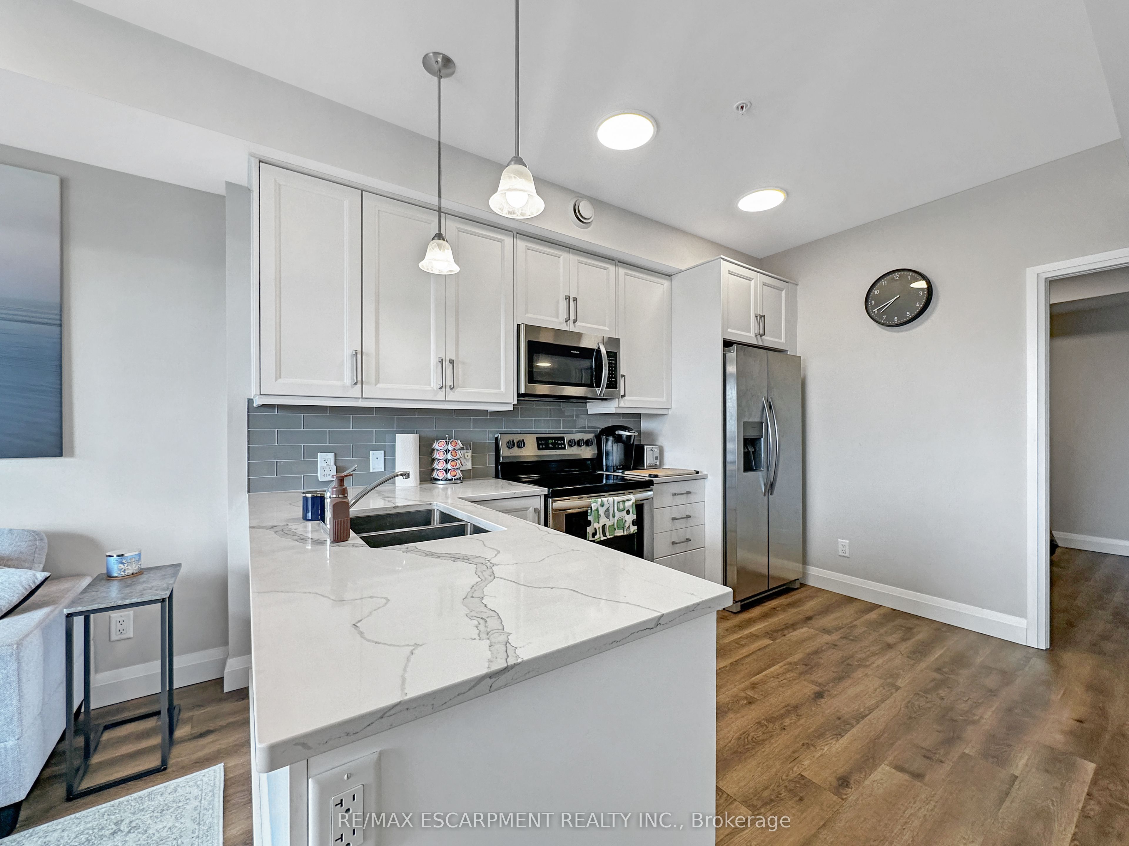 Photo 37 of Unit 409, 64 Main Street N, Haldimand — HOMEH