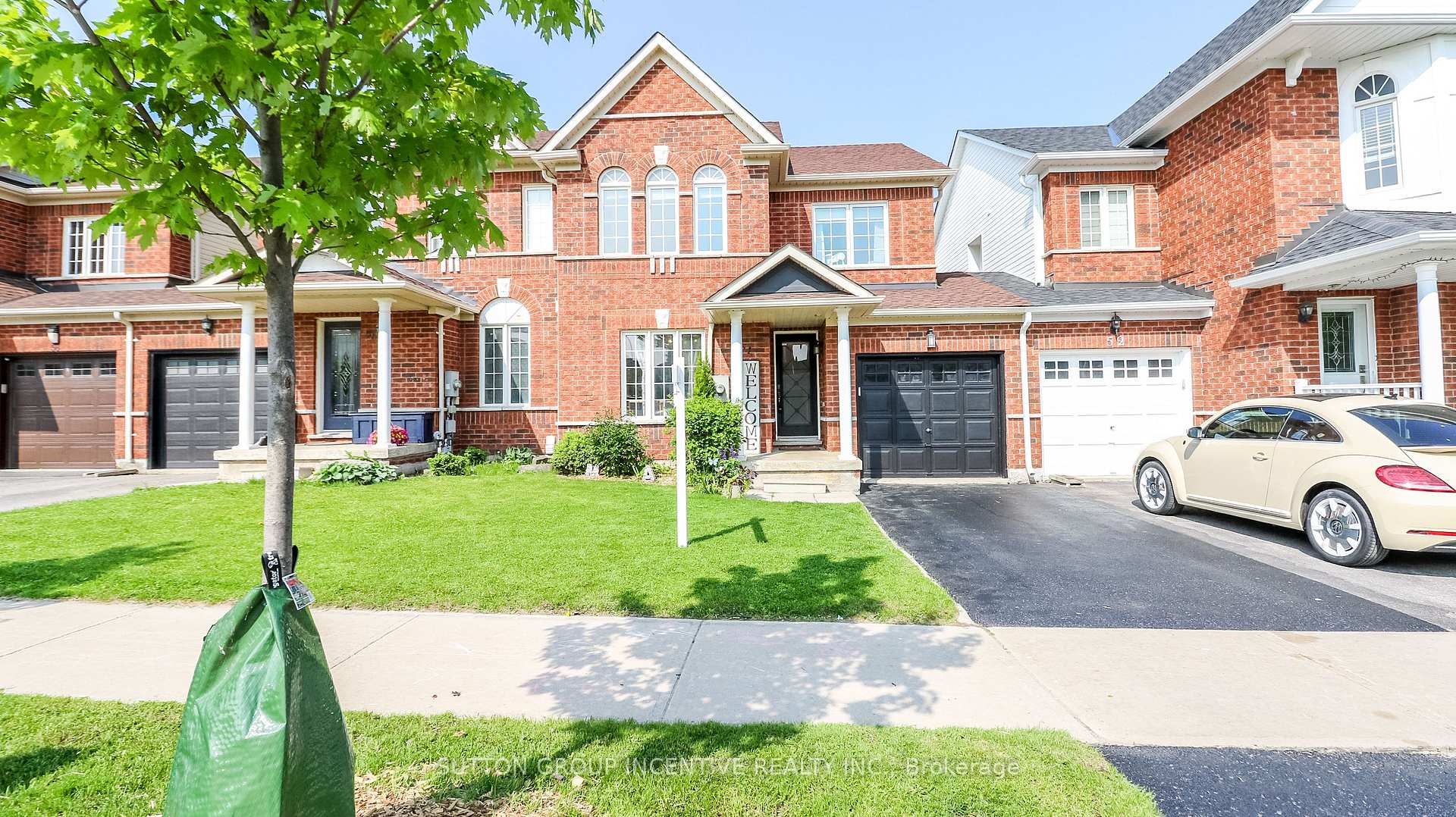 Front of 54 Succession Crescent W