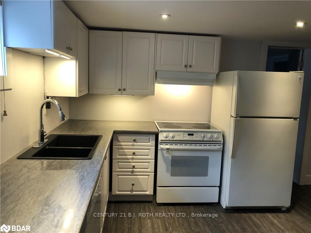Photo 4 of Unit LOWER L, 219 Huronia Road, Barrie, Innis-Shore — HOMEH