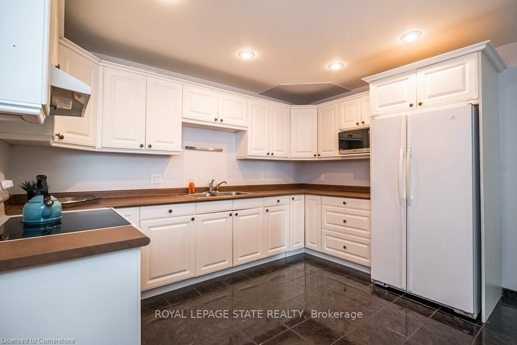 Photo 10 of 136 Dundurn Street N, Hamilton, Strathcona — HOMEH