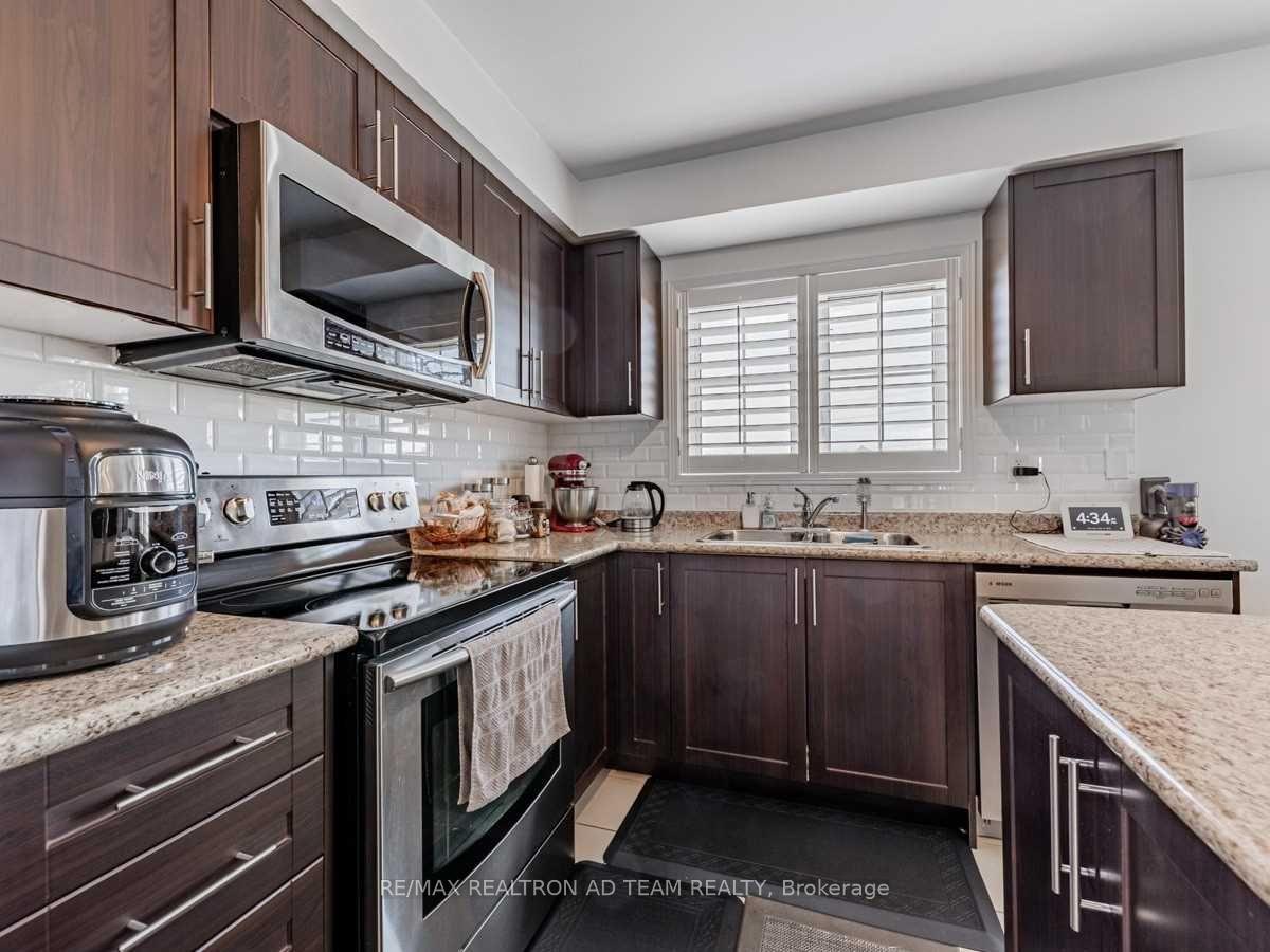 Photo 14 of 437 Rossland Road E, Ajax, Central East — HOMEH