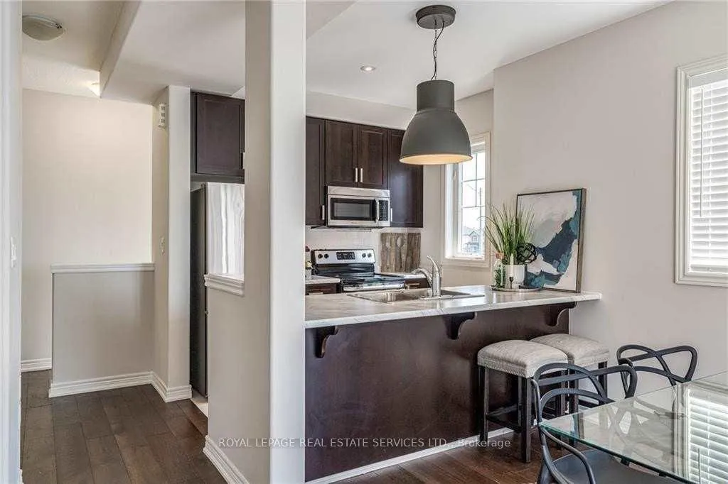Photo 6 of Unit 47, 201 Westbank Trail, Hamilton, Stoney Creek Mountain — HOMEH