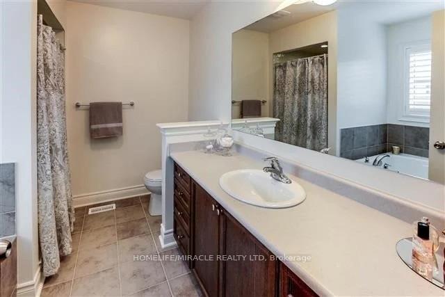 Photo 12 of 10 Andretti Crescent, Brampton, Credit Valley — HOMEH