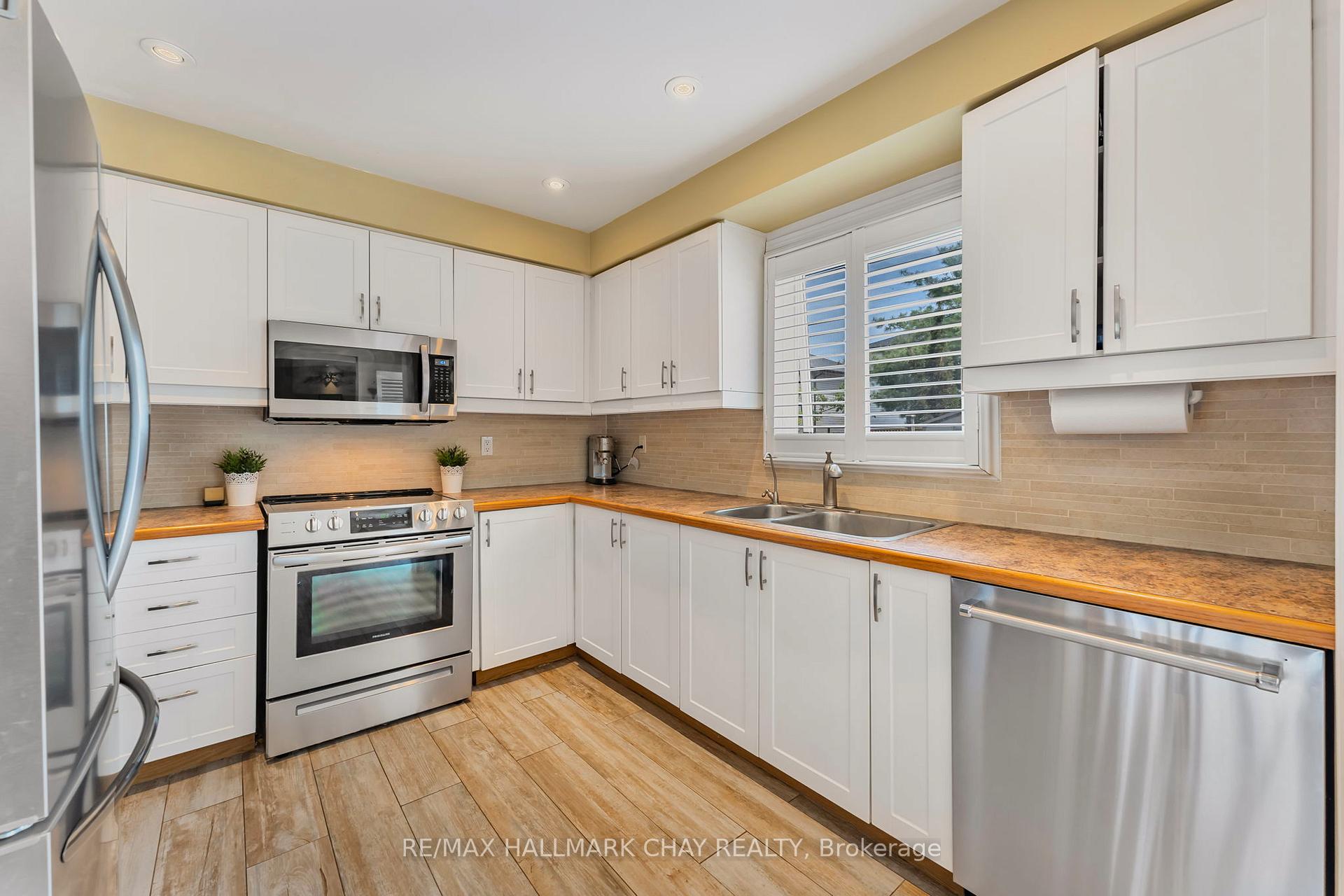 Photo 12 of 58 Carruthers Crescent, Barrie, Grove East — HOMEH