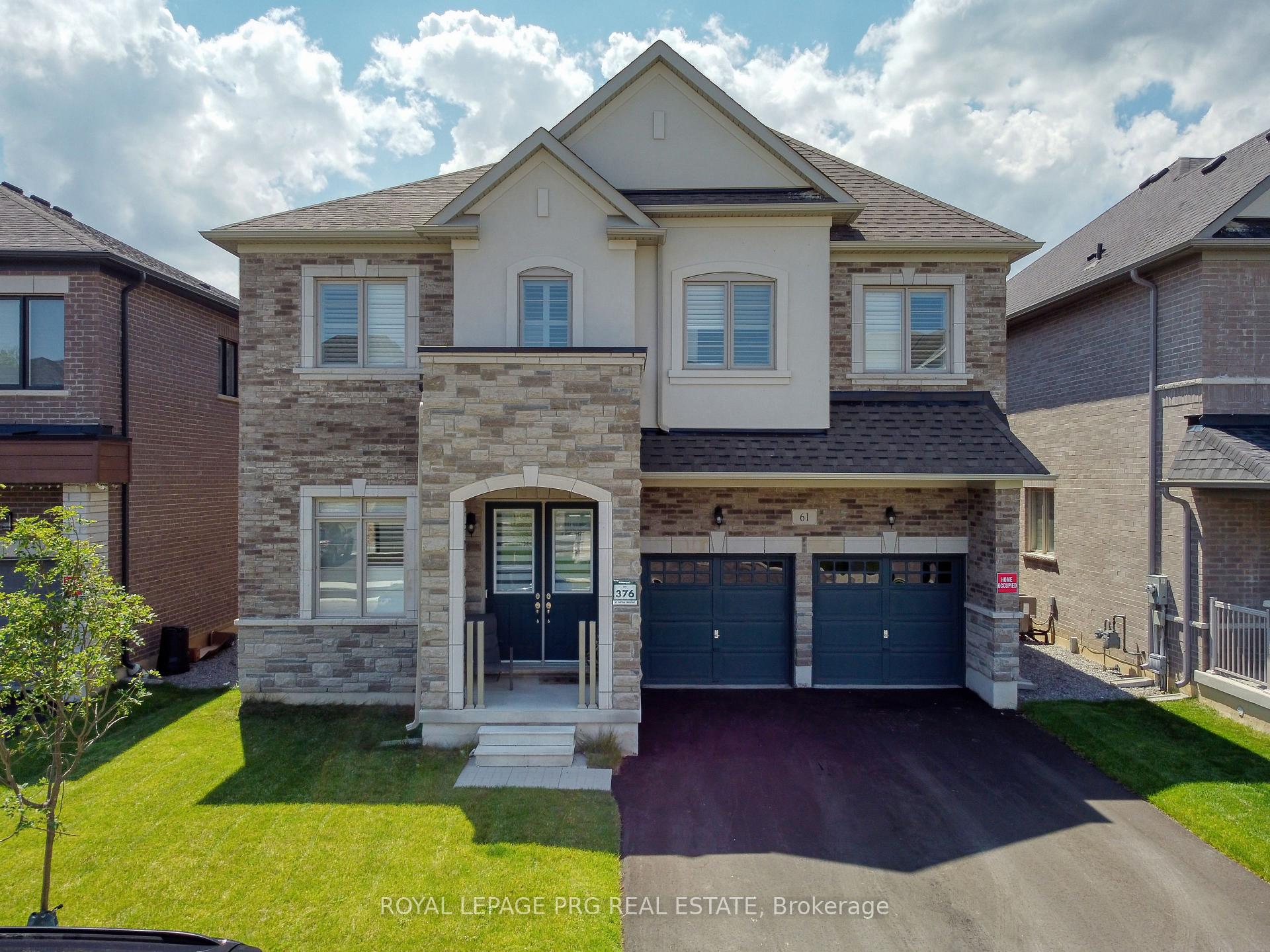 Front of 61 Cattail Crescent