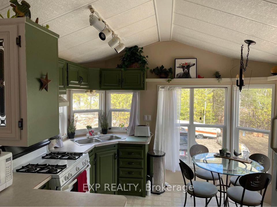 Photo 8 of 11579 Highway 509, Frontenac, Frontenac North — HOMEH