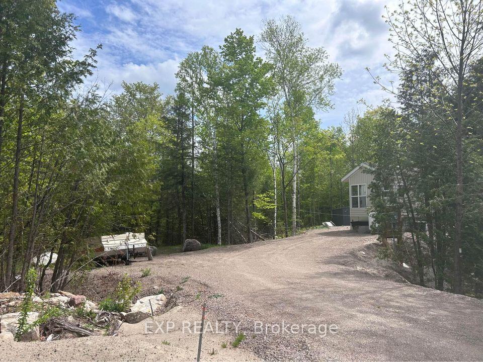 Photo 21 of 11579 Highway 509, Frontenac, Frontenac North — HOMEH