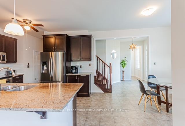 Photo 5 of 290 Thomas Phillips Drive, Aurora, Rural Aurora — HOMEH