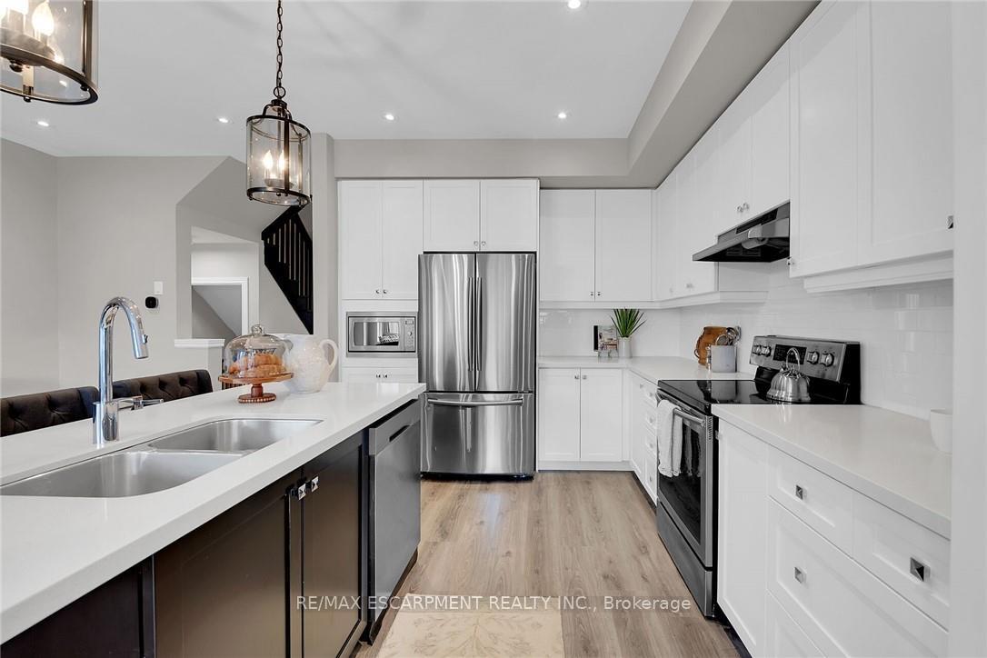 Photo 9 of Unit 31, 1890 Rymal Road E, Hamilton, Rural Glanbrook — HOMEH