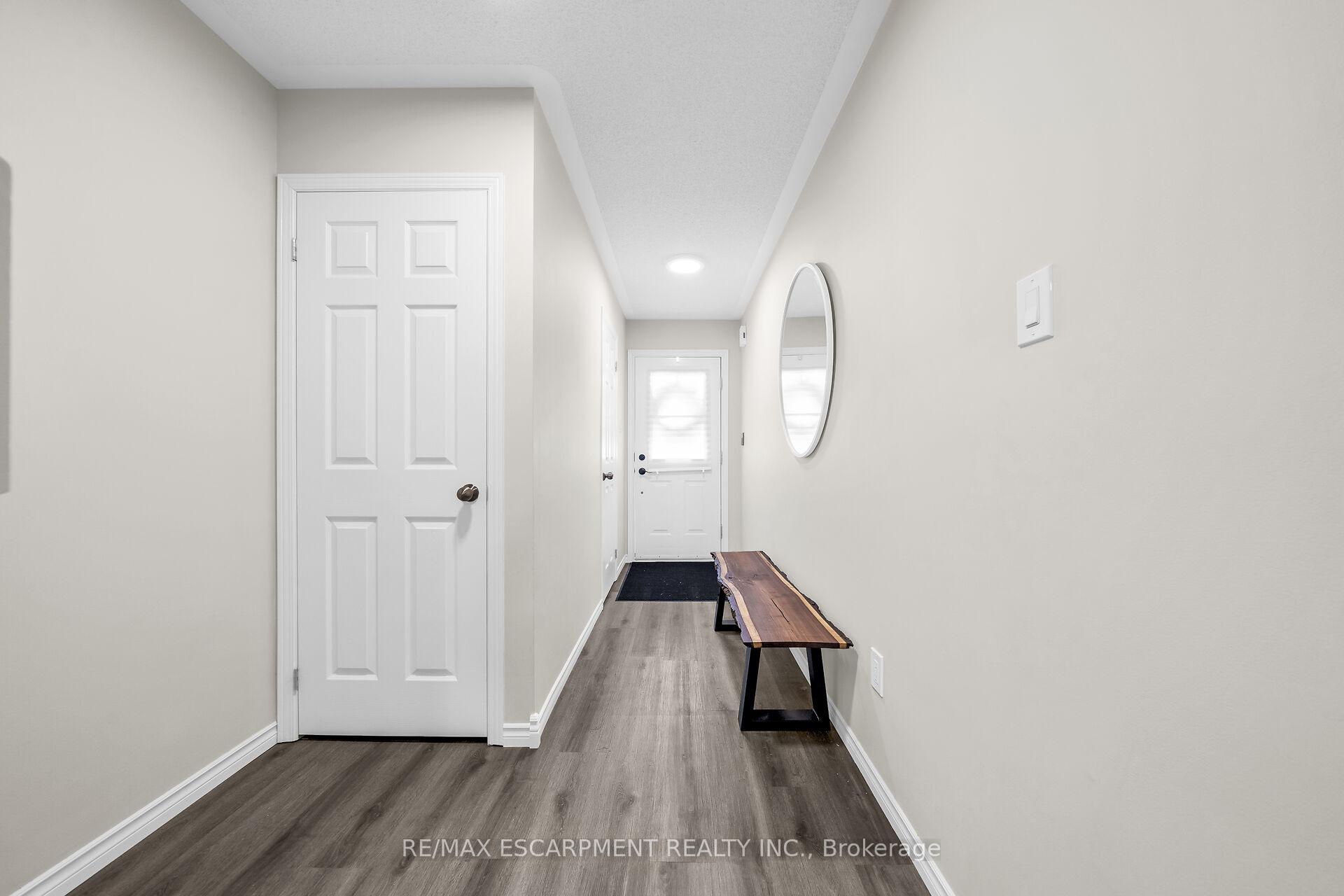 Photo 4 of 5115 Silvercreek Drive, Burlington, Uptown — HOMEH