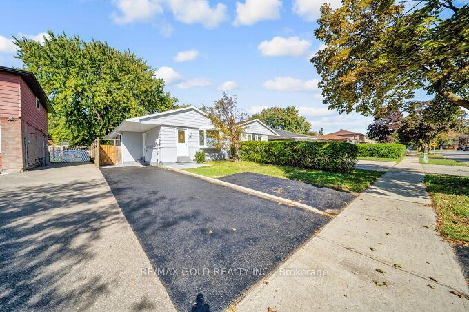 Front of 118 Archdekin Drive