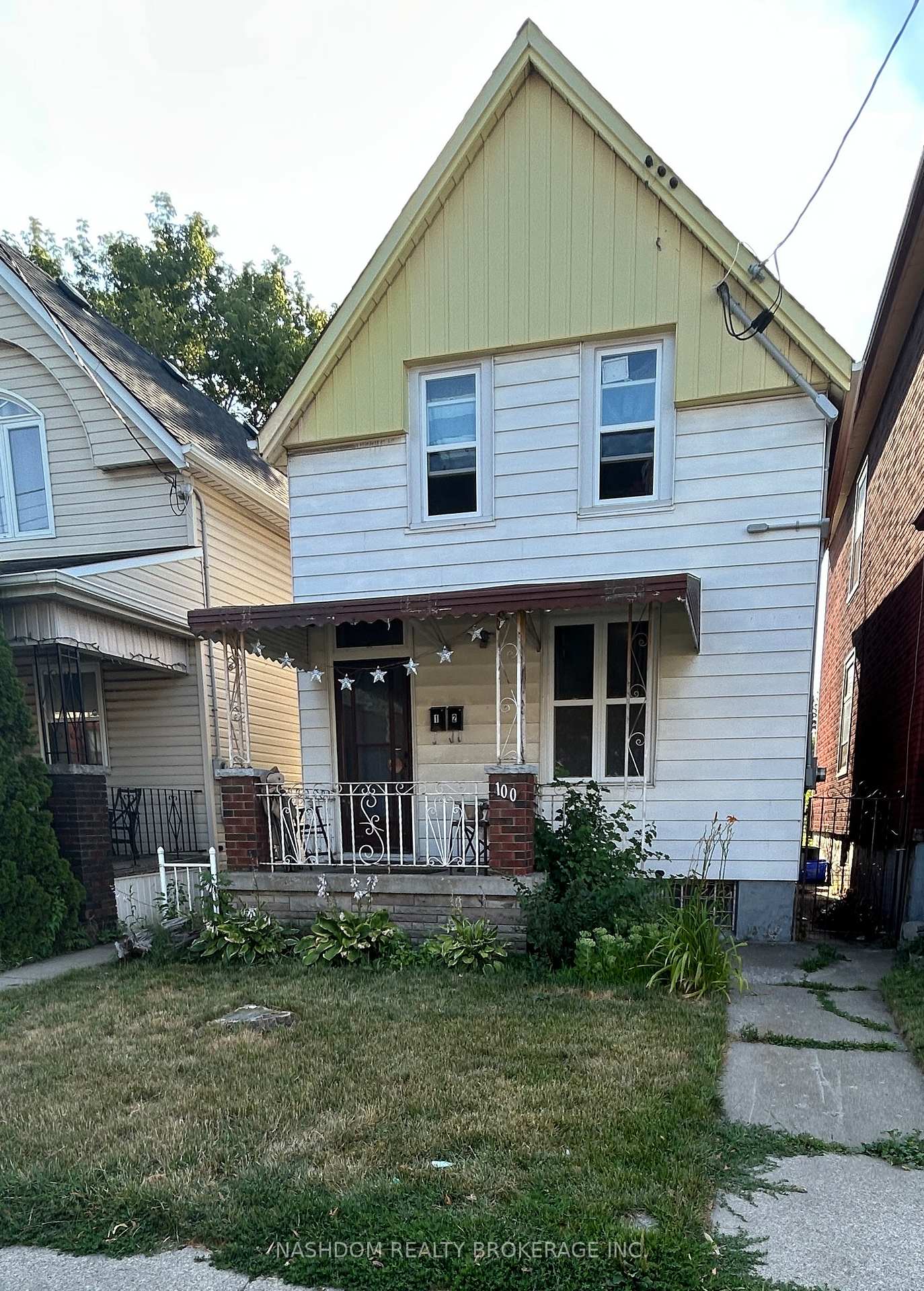 Front of 100 Sherman Avenue N