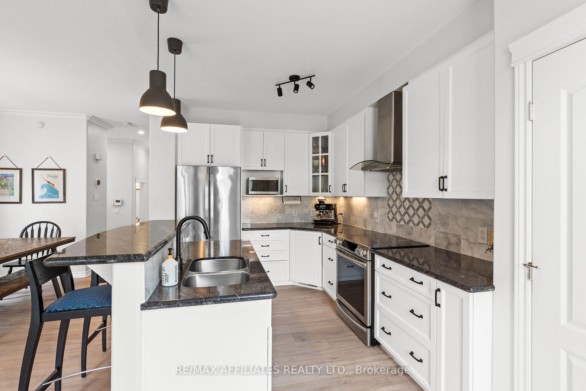 Photo 10 of 110 Waterbridge Drive, Ottawa, Barrhaven East — HOMEH