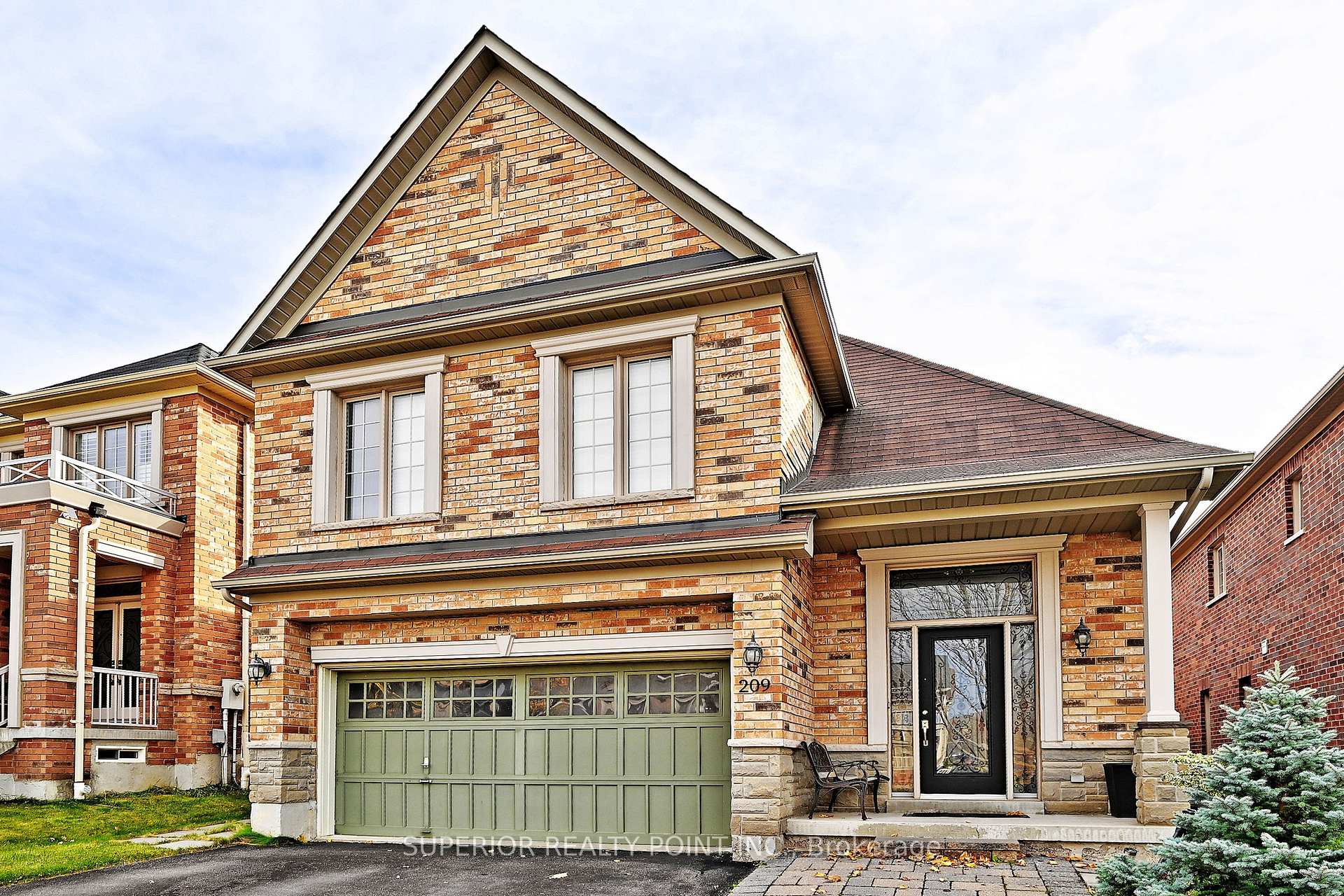 Front of 209 Queen Filomena Avenue