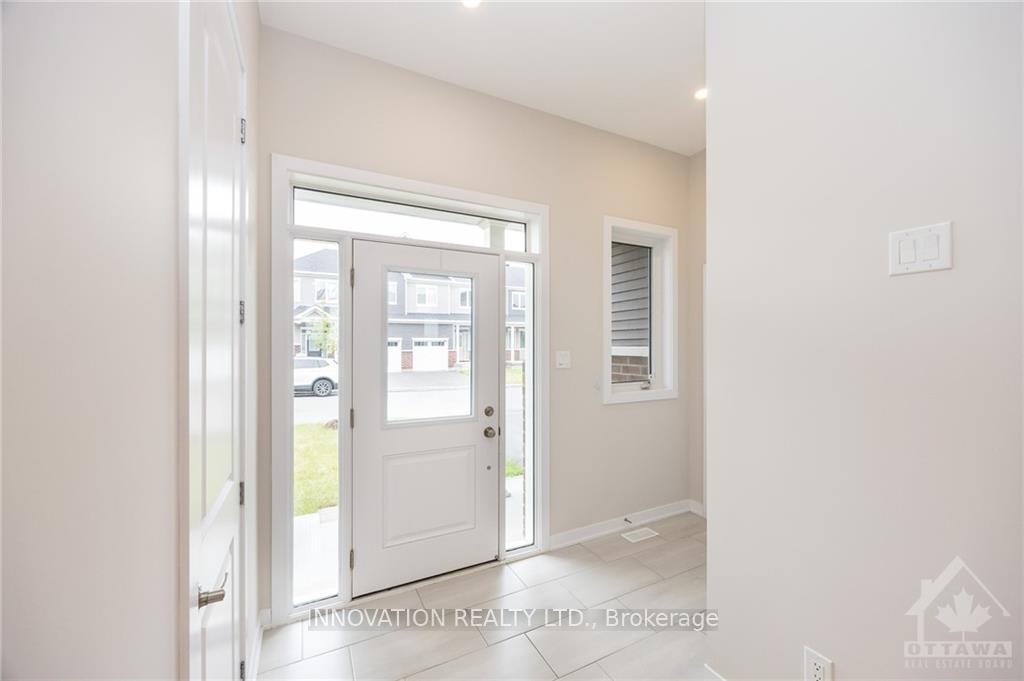 Photo 2 of 261 Surface Lane, Ottawa, Barrhaven - Half Moon Bay — HOMEH