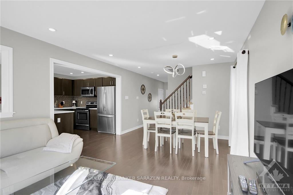 Photo 5 of 411 Meadowhawk Crescent, Ottawa, Barrhaven - Half Moon Bay — HOMEH