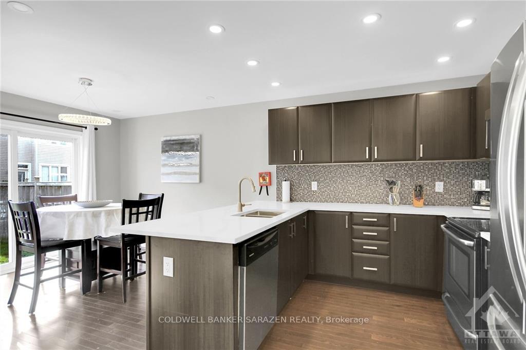 Photo 6 of 411 Meadowhawk Crescent, Ottawa, Barrhaven - Half Moon Bay — HOMEH