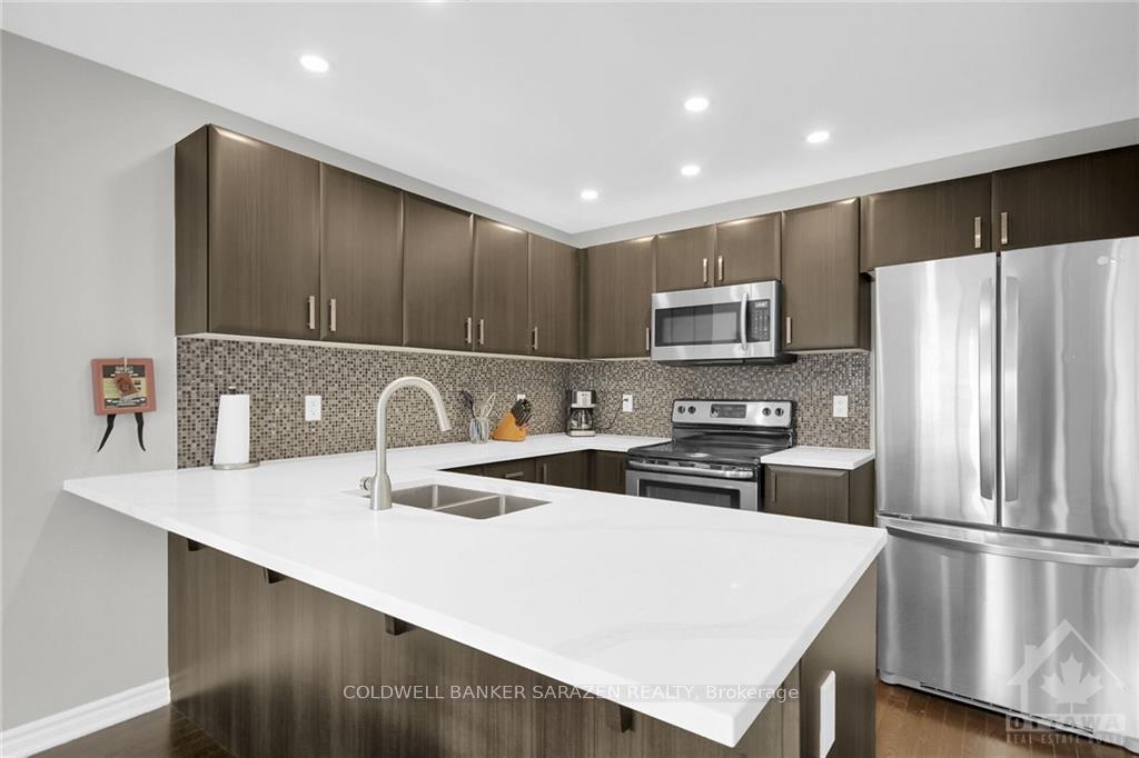Photo 8 of 411 Meadowhawk Crescent, Ottawa, Barrhaven - Half Moon Bay — HOMEH