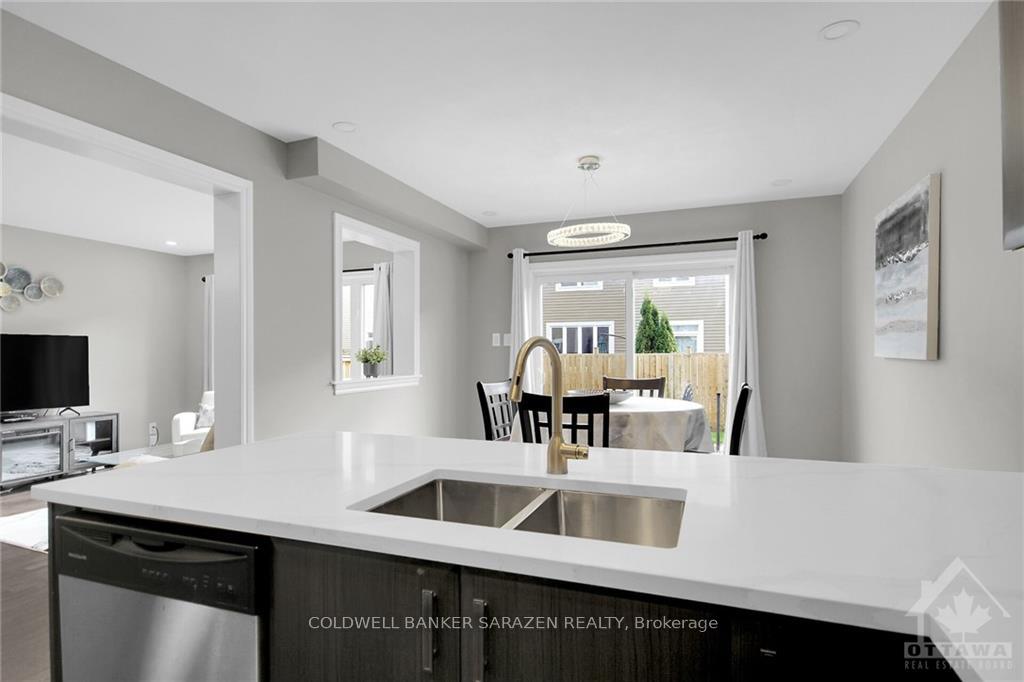 Photo 10 of 411 Meadowhawk Crescent, Ottawa, Barrhaven - Half Moon Bay — HOMEH