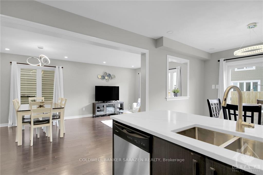 Photo 11 of 411 Meadowhawk Crescent, Ottawa, Barrhaven - Half Moon Bay — HOMEH