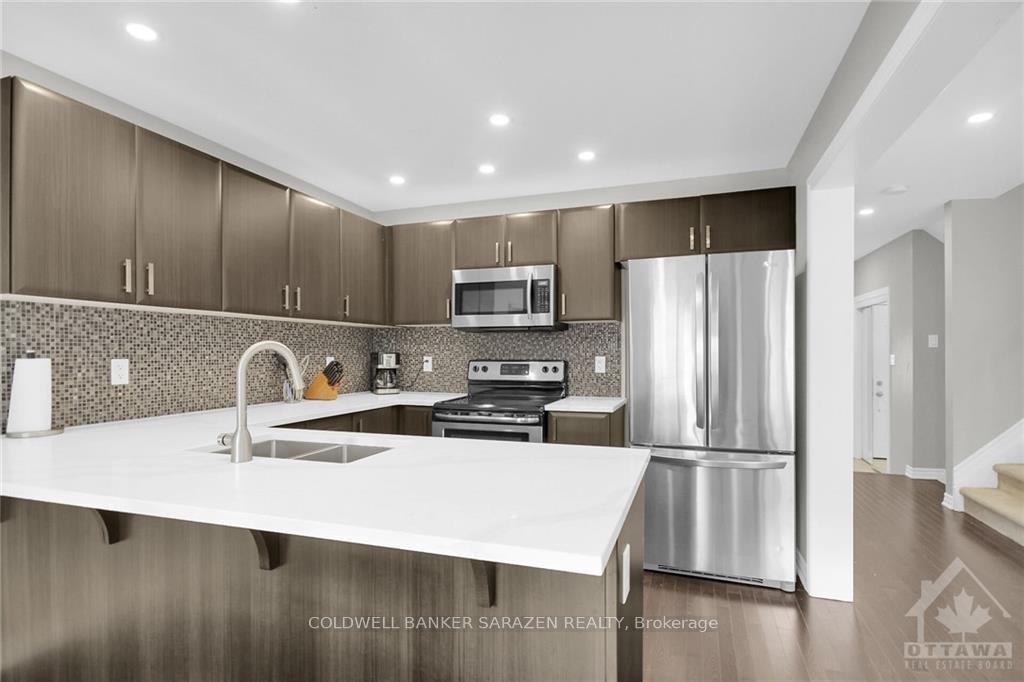Photo 13 of 411 Meadowhawk Crescent, Ottawa, Barrhaven - Half Moon Bay — HOMEH