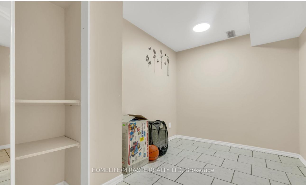 Photo 11 of Unit Bsmt, 32 Elmpark Court, Brampton, Vales of Castlemore — HOMEH