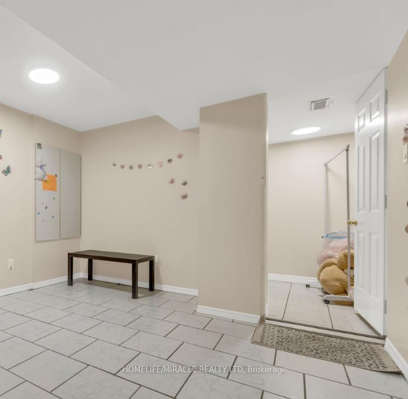 Photo 5 of Unit Bsmt, 32 Elmpark Court, Brampton, Vales of Castlemore — HOMEH