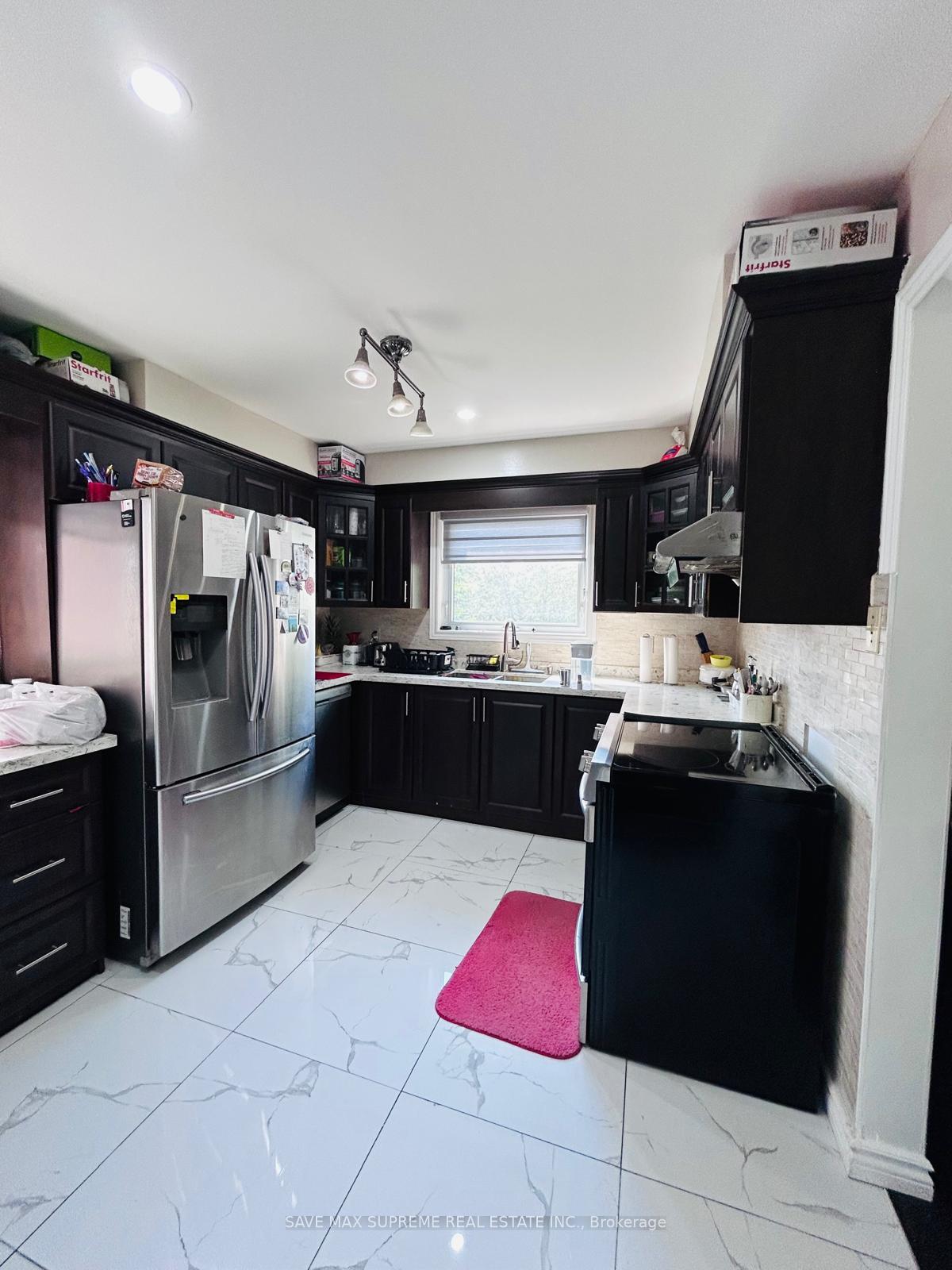 Photo 9 of 18 Bach Blvd, Brampton, Brampton South — HOMEH