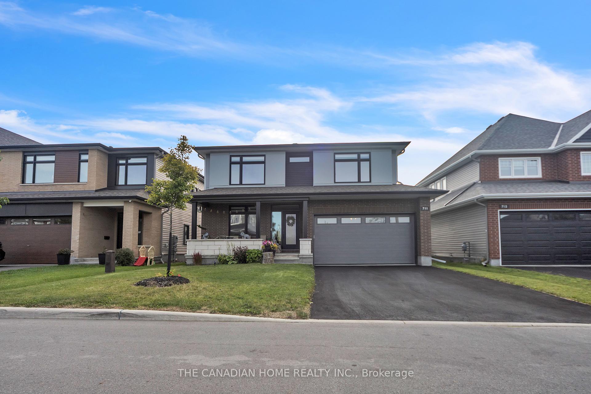Front of 711 Moonflower Crescent