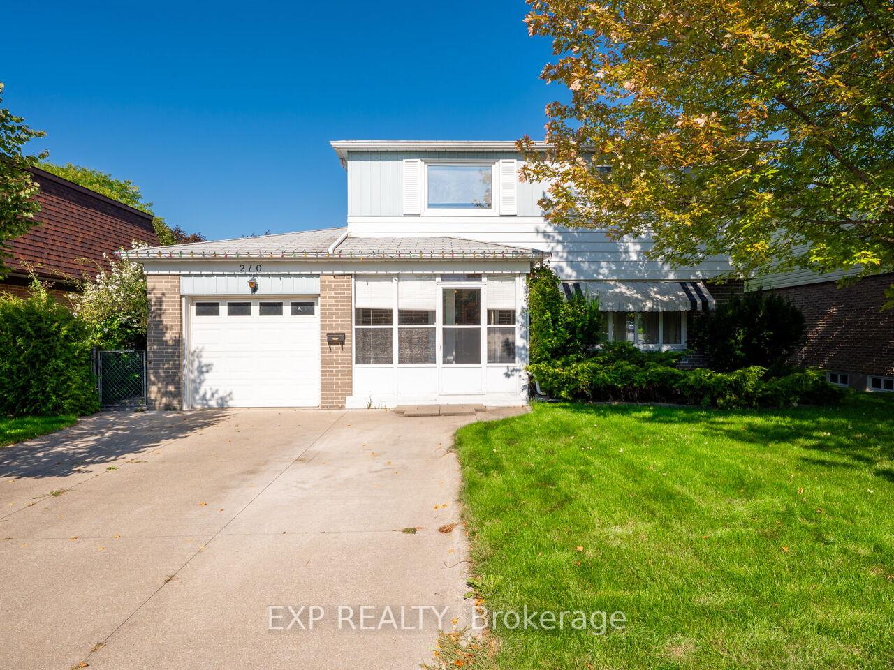 Front of 210 Mcmurchy Avenue S