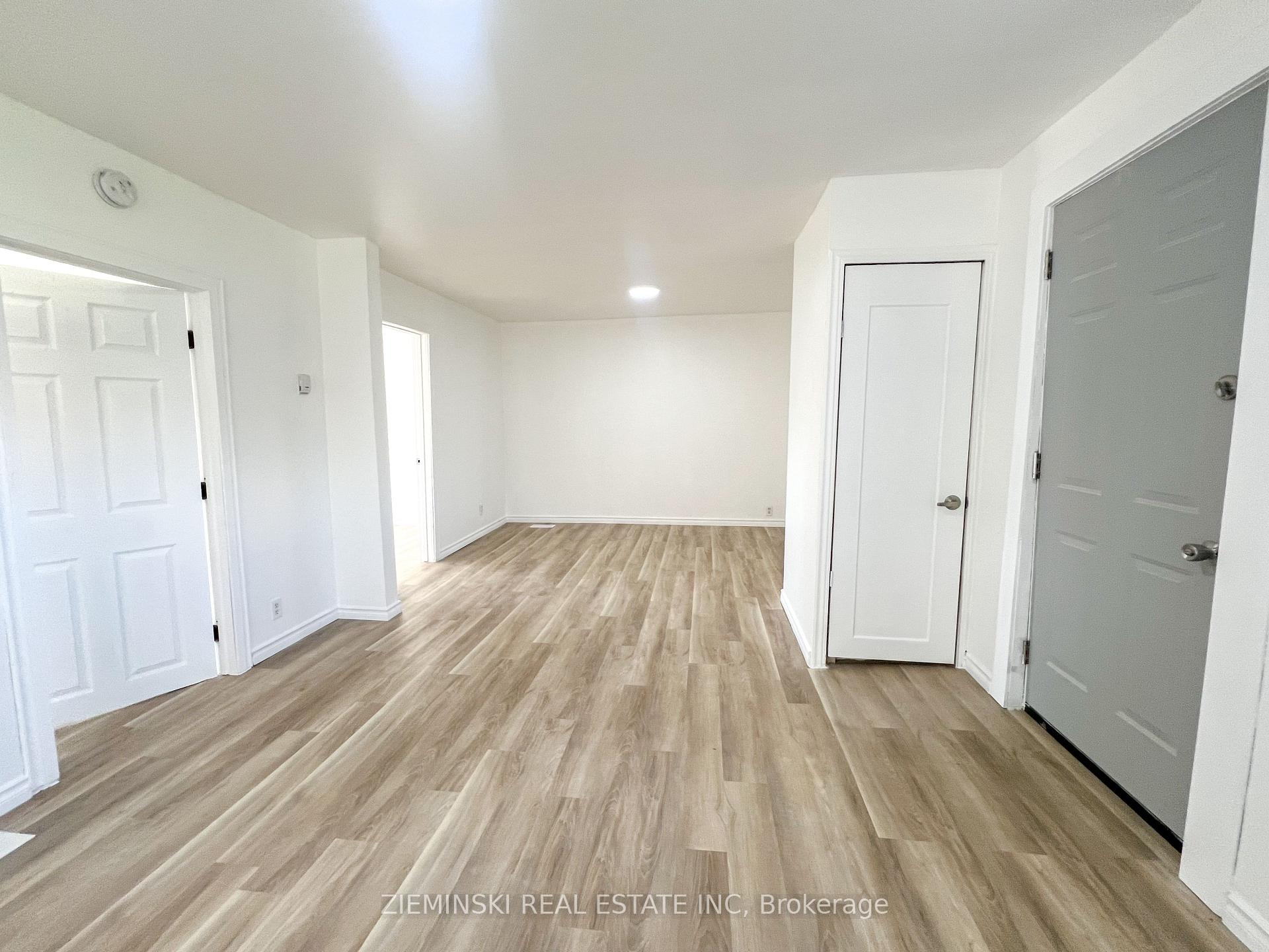 Photo 12 of Unit A, 310 Ninth Avenue, Cochrane — HOMEH