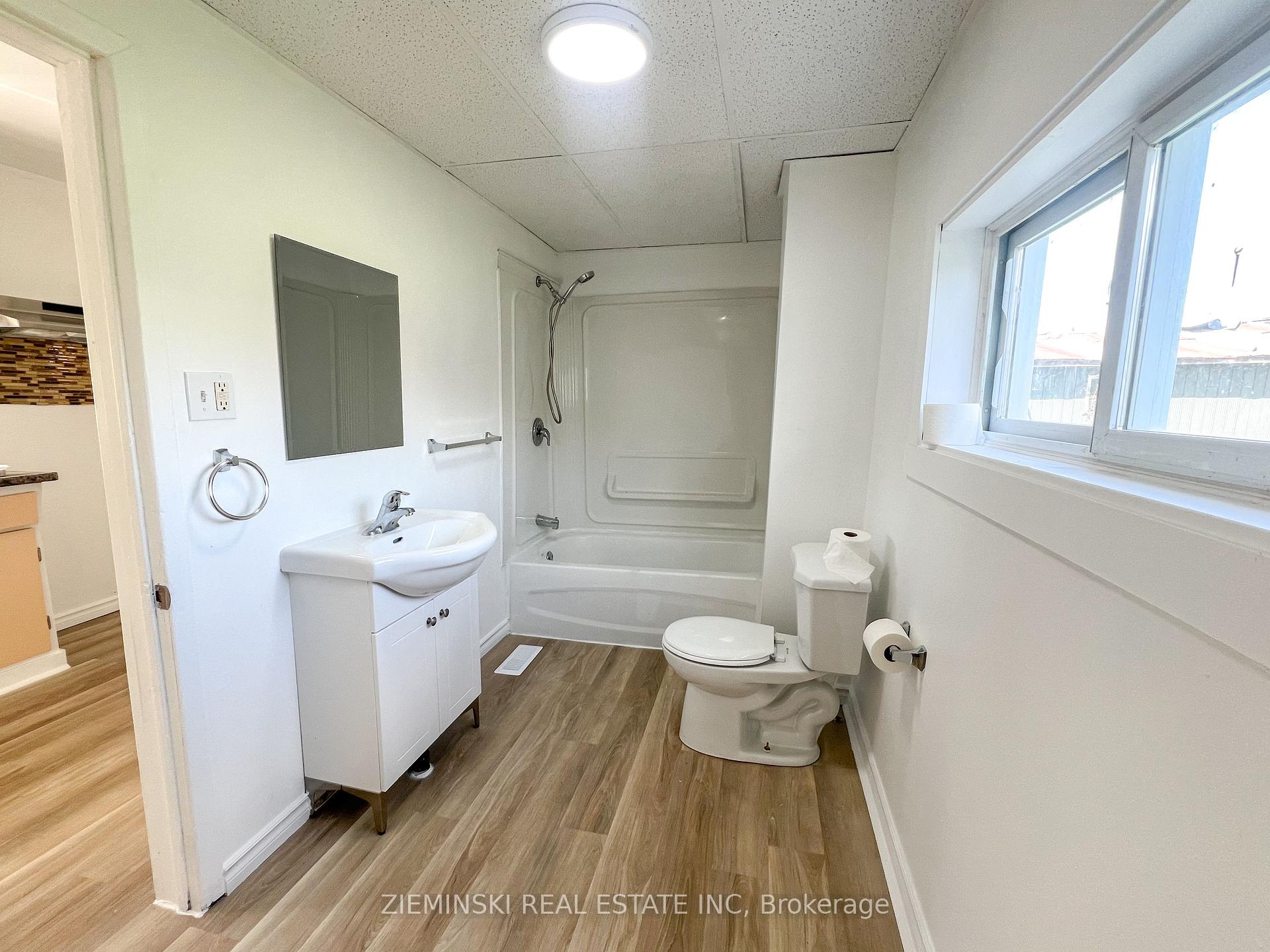 Photo 5 of Unit A, 310 Ninth Avenue, Cochrane — HOMEH