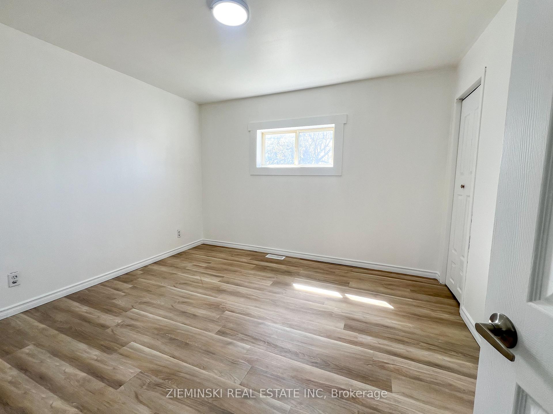 Photo 11 of Unit A, 310 Ninth Avenue, Cochrane — HOMEH