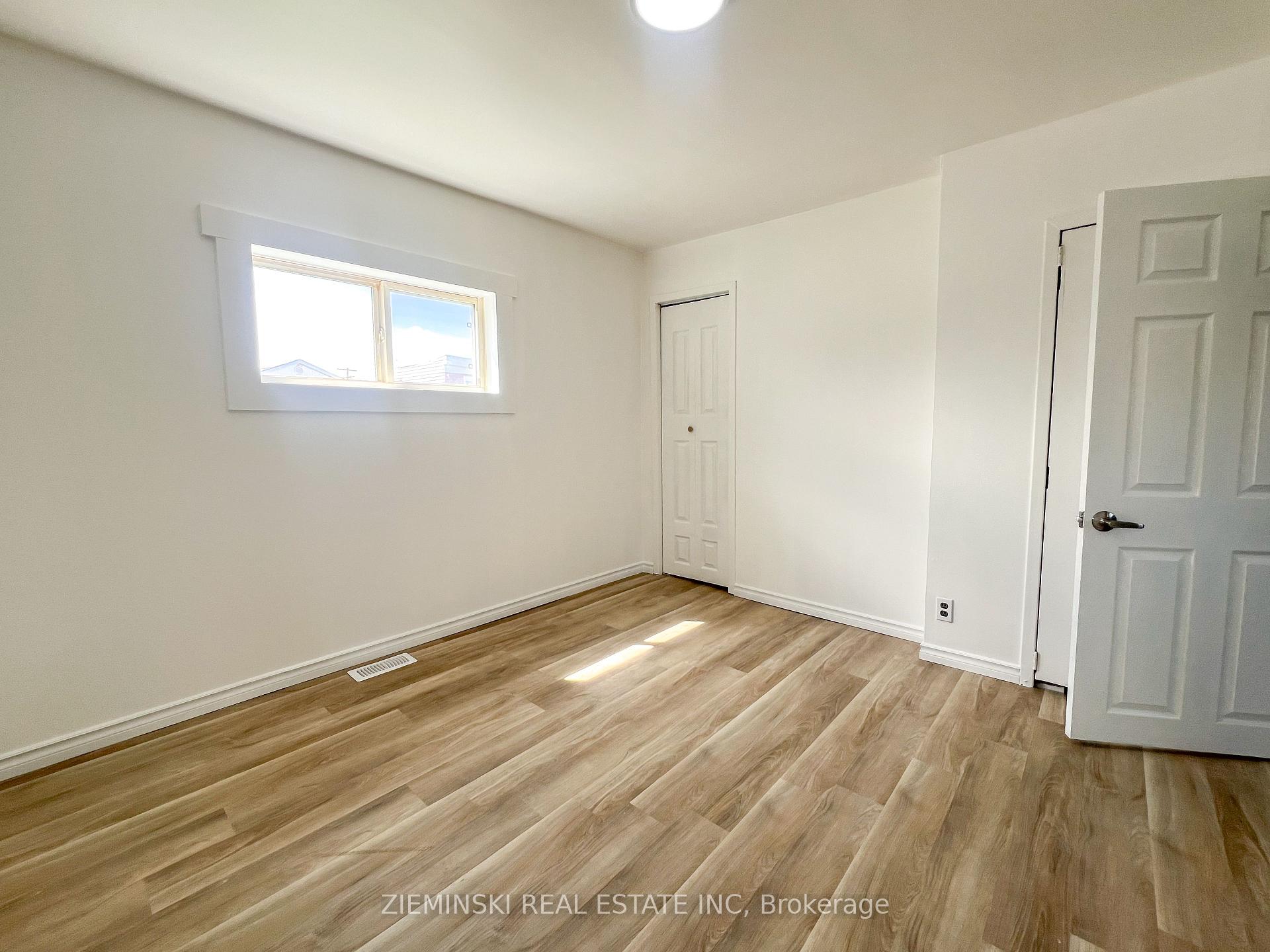 Photo 10 of Unit A, 310 Ninth Avenue, Cochrane — HOMEH