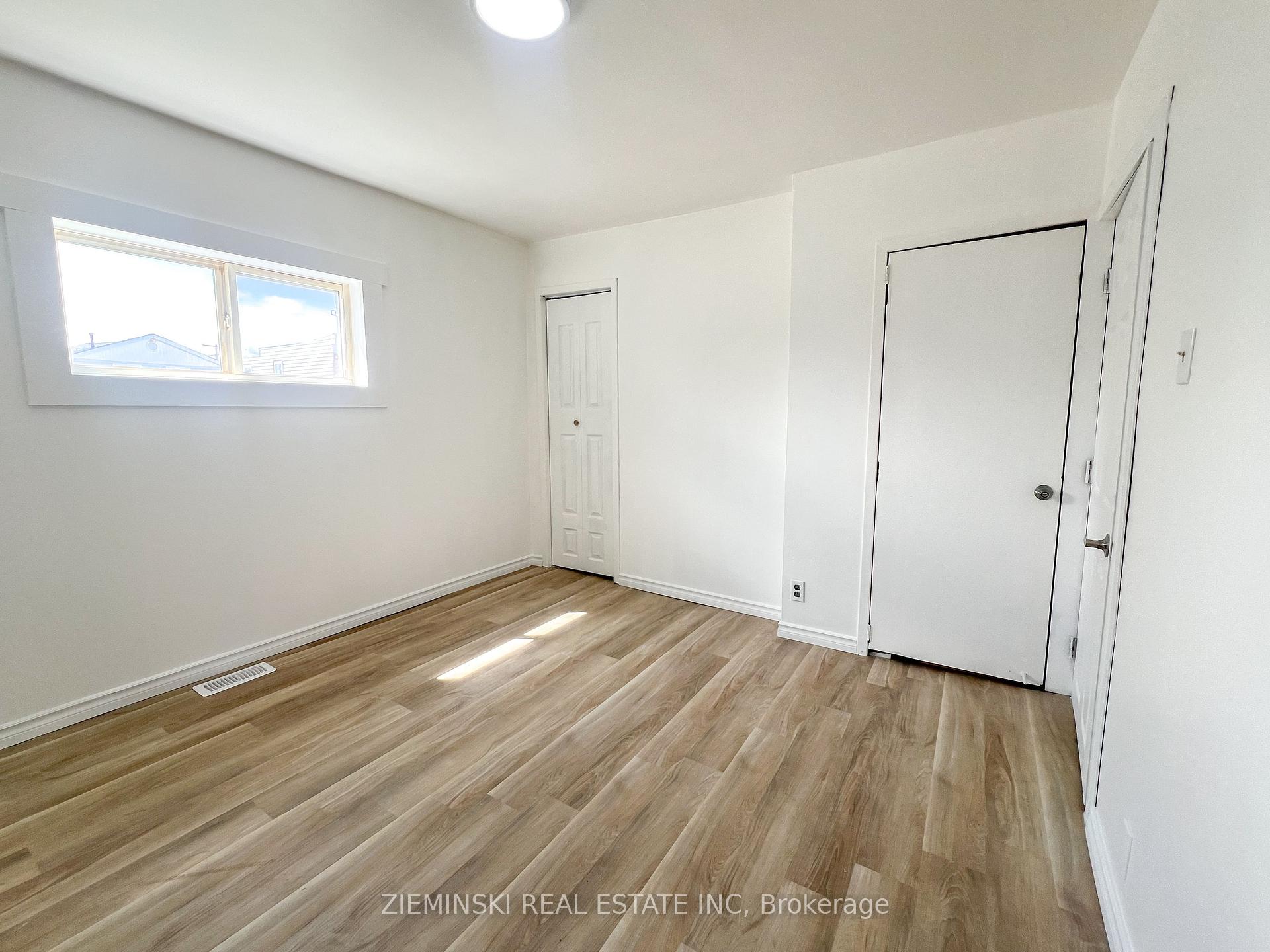 Photo 7 of Unit A, 310 Ninth Avenue, Cochrane — HOMEH