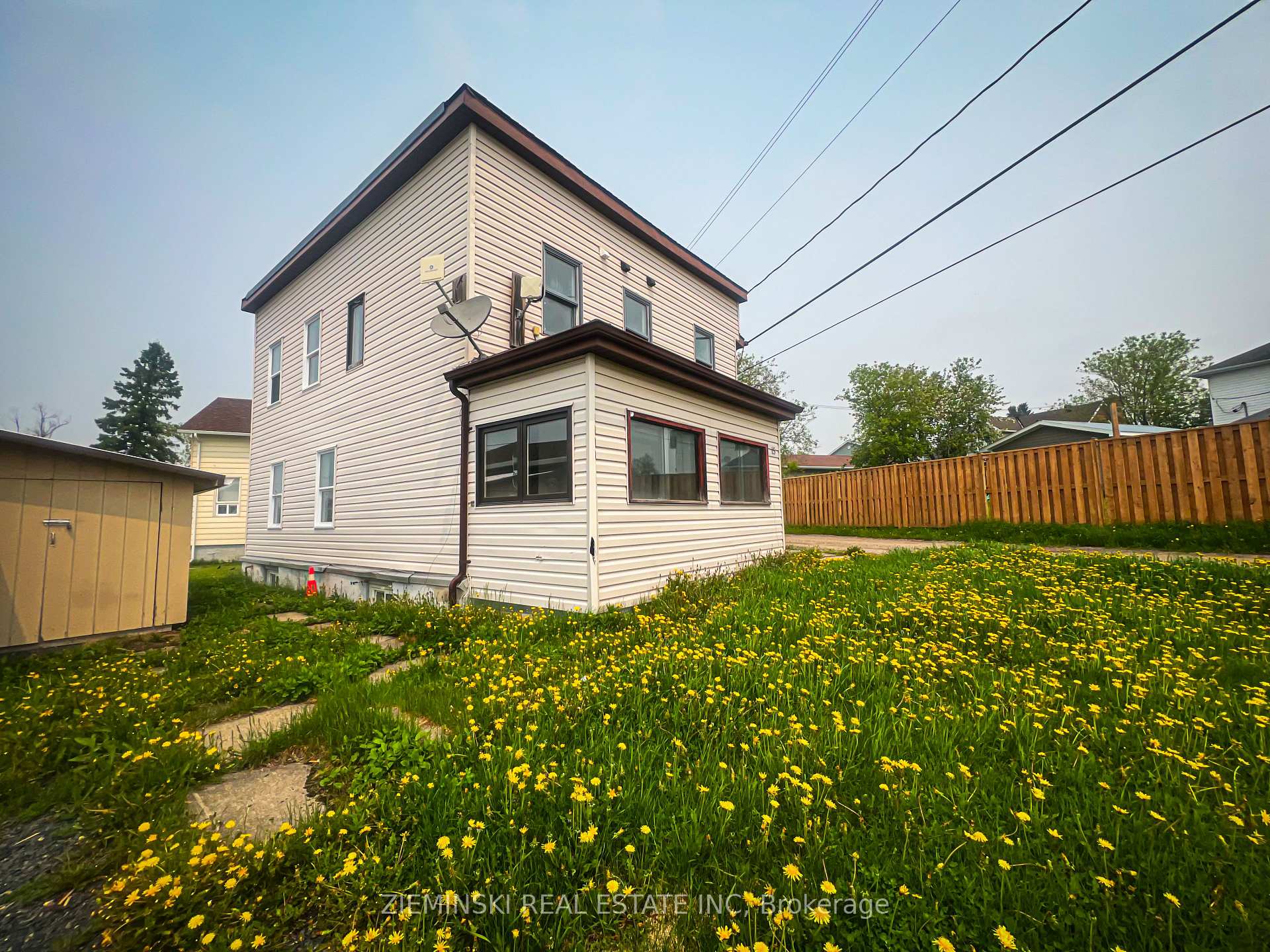 Photo 1 of Unit A, 15 Fourth Street, Cochrane — HOMEH