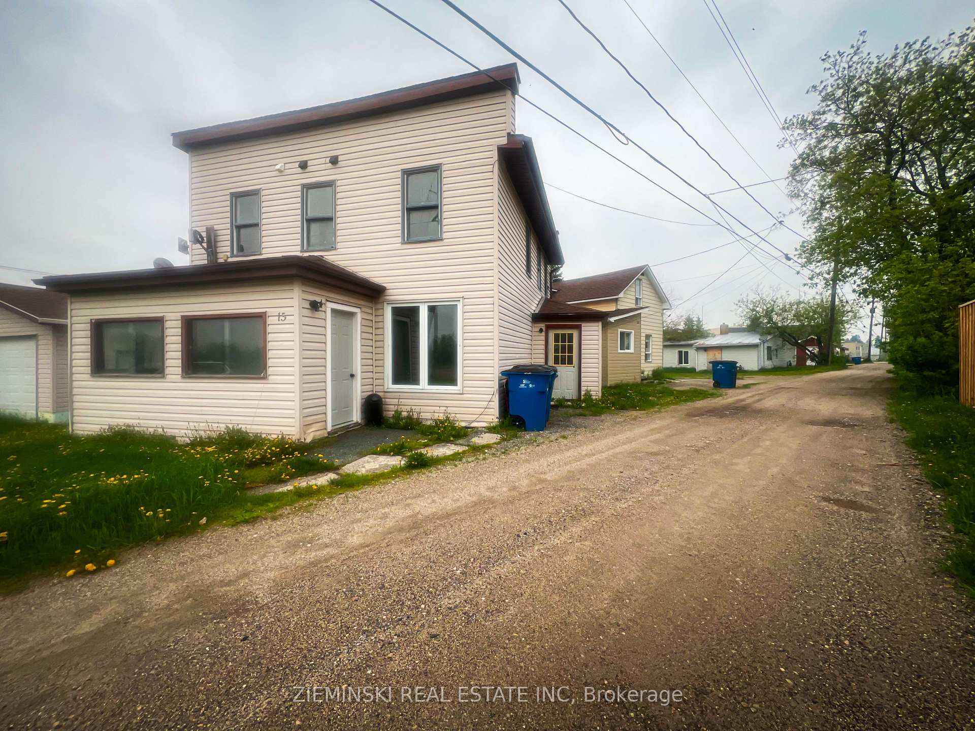 Photo 2 of Unit A, 15 Fourth Street, Cochrane — HOMEH