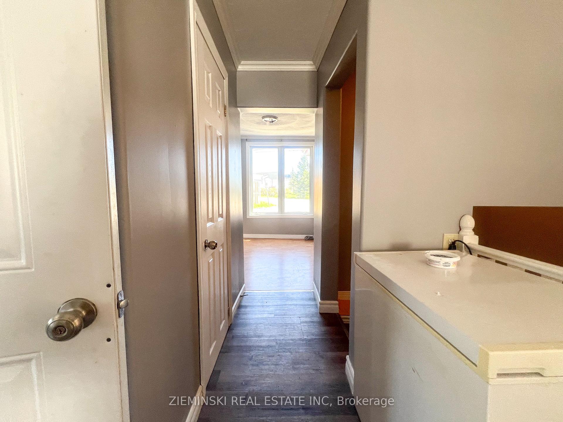Photo 12 of Unit A, 15 Fourth Street, Cochrane — HOMEH